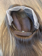 Close-up of the interior cap of Natural Black Kinky Straight Yaki Wig, 18-24", HD Lace, Glueless, Human Hair, showing adjustable elastic band, interior combs, and neat wig construction