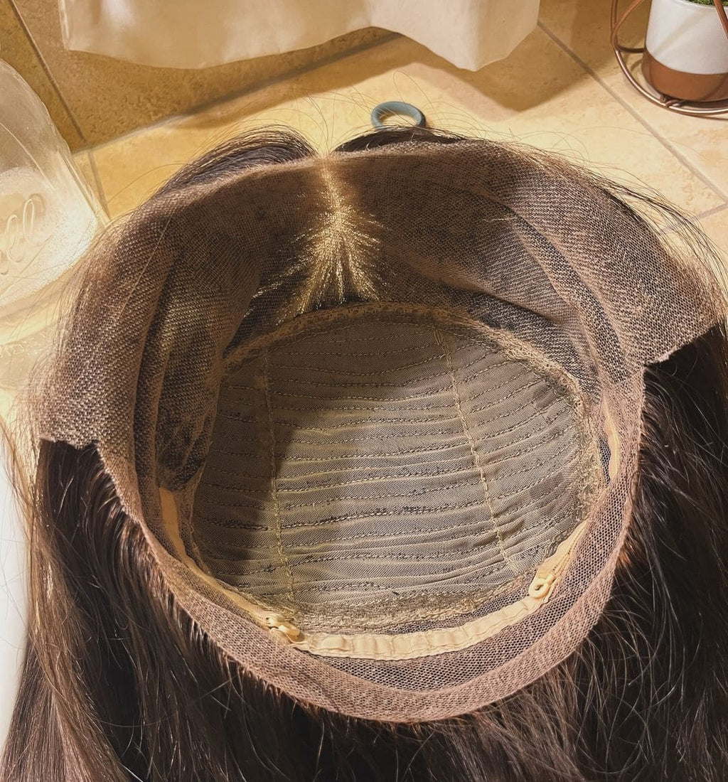 Interior view of ARIA 360 Lace Wig cap, full circular lace coverage, 14-24 inch, adjustable straps and combs for secure fit, breathable and comfortable mesh base.