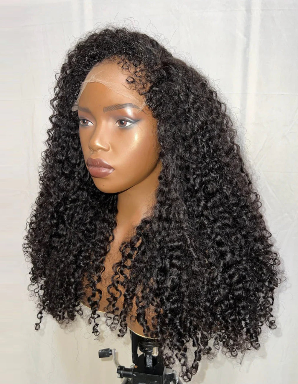 Right side view of KAI Natural Black Kinky Curly Wig, 7x5 Lace, Human Hair, 4C Kinky Texture, Soft Bouncy Curls, Fashionable