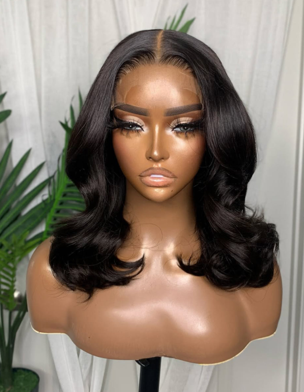 Front view of LEILA Natural Black Beach Wave Bob Wig, 14-16", 7x5 Lace Closure, Glueless, Human Hair, Soft Waves, Stylish and Wear-and-Go