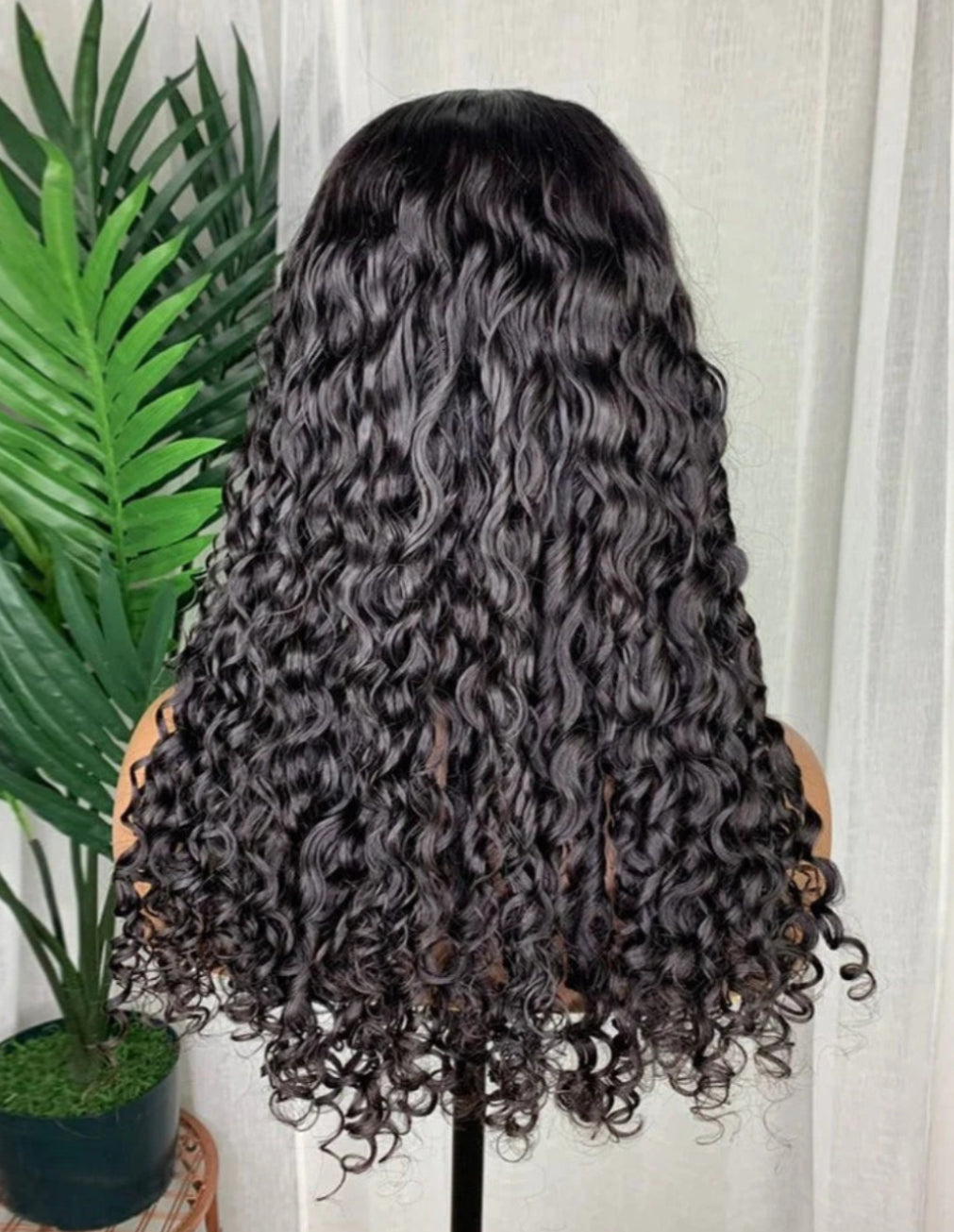 Back view of NAOMI Natural Black Deep Wave Wig, 16-26", 7x5 Lace, Glueless, Human Hair, Layered Deep Waves, Soft Texture, Stylish