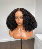 Front view of Natural Black Kinky Curly Wig on mannequin, 14-22", 13x4 Lace, Human Hair, Soft 4B-4C Curls, Stylish and Wear-and-Go