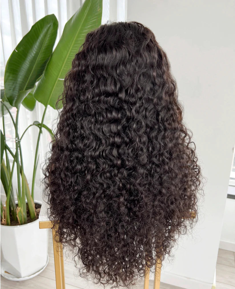 Back view of Natural Black Water Wave Wig, 13x4 lace frontal, 18-24 inch length, defined and uniform water wave pattern, tangle-free.