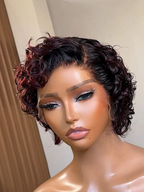 Side view of Raven Burgundy Pixie Cut, 13x4 lace frontal, 10-12 inch, tapered back and sides, defined curly texture, seamless hairline melt, breathable wig cap.