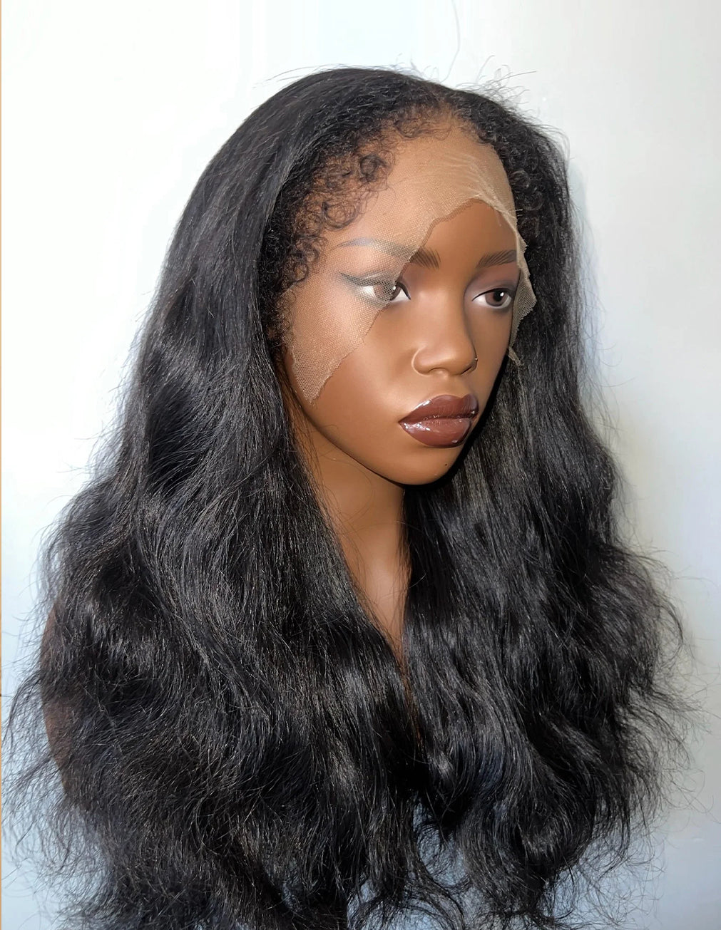 Side view of Raw Wavy 13x6 HD Lace Wig, 18-24", invisible HD lace melt, pre-plucked natural hairline, seamless blend, glueless install.