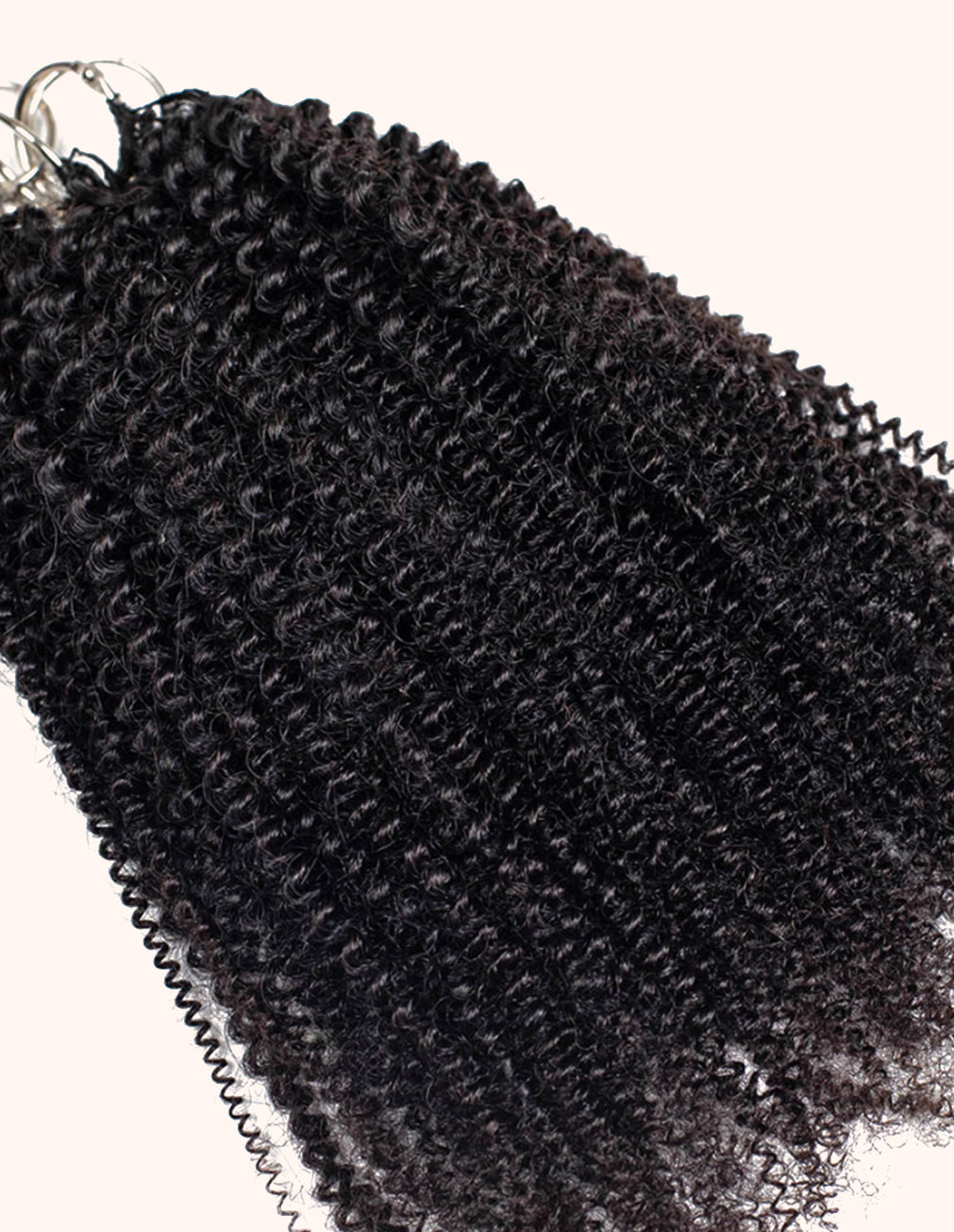 Curly crochet hair extensions are made with 100% human hair.