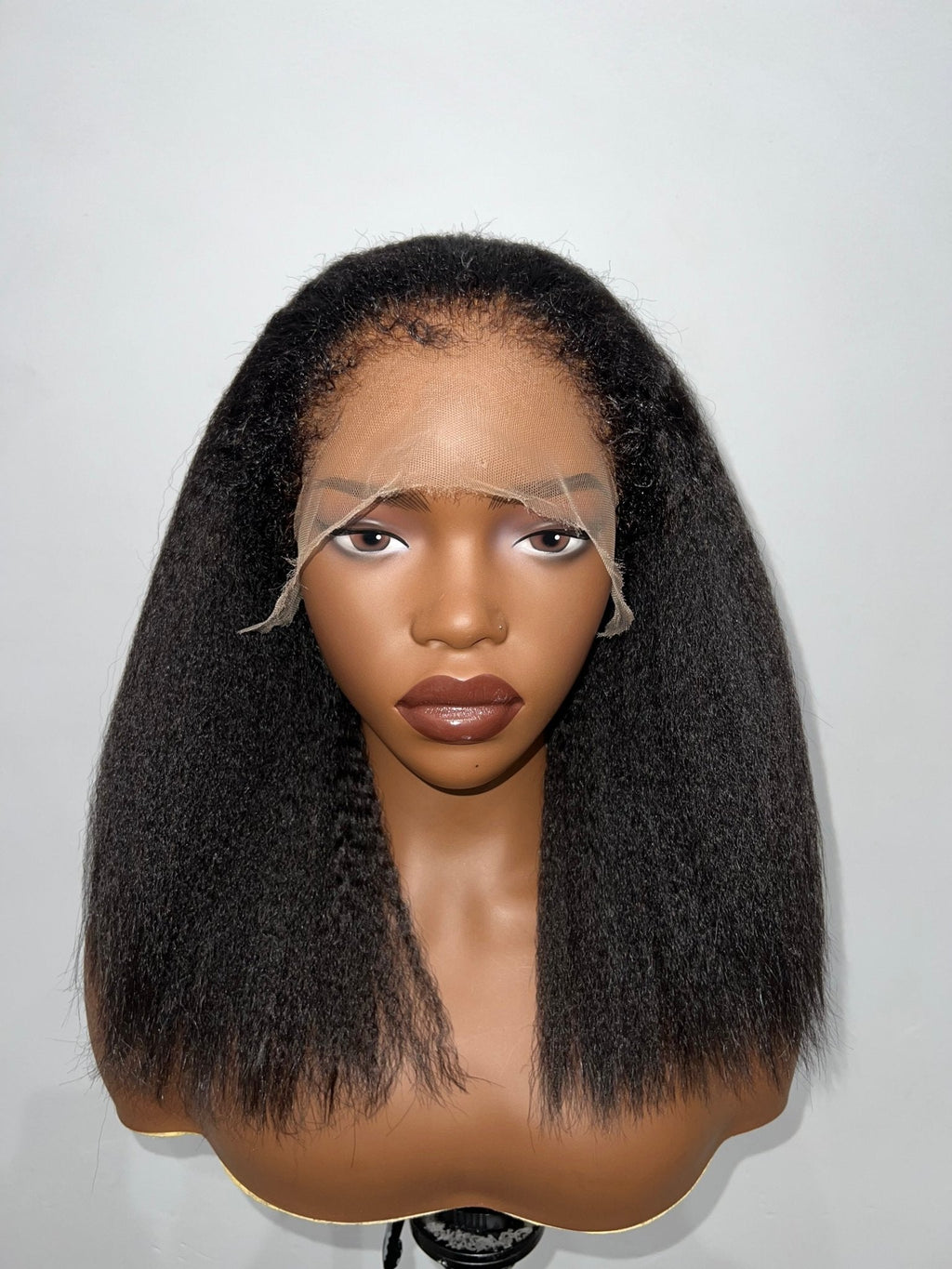 Front view of 4A-4C Kinky Straight Wig with 4B Hairline, 13x4 lace frontal, 16-22 inches, displayed on mannequin showing natural hairline and full volume.