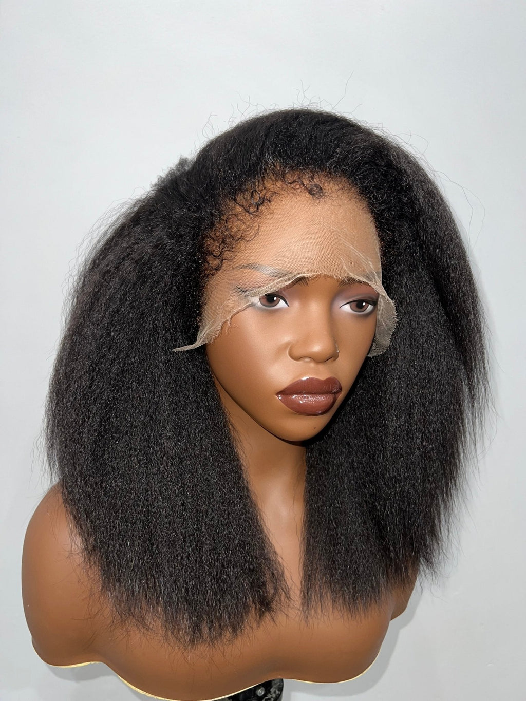 Angled view of 4A-4C Kinky Straight Wig with 4B Hairline, 13x4 lace frontal, 16-22 inch, illustrating natural shine and realistic hairline on mannequin.