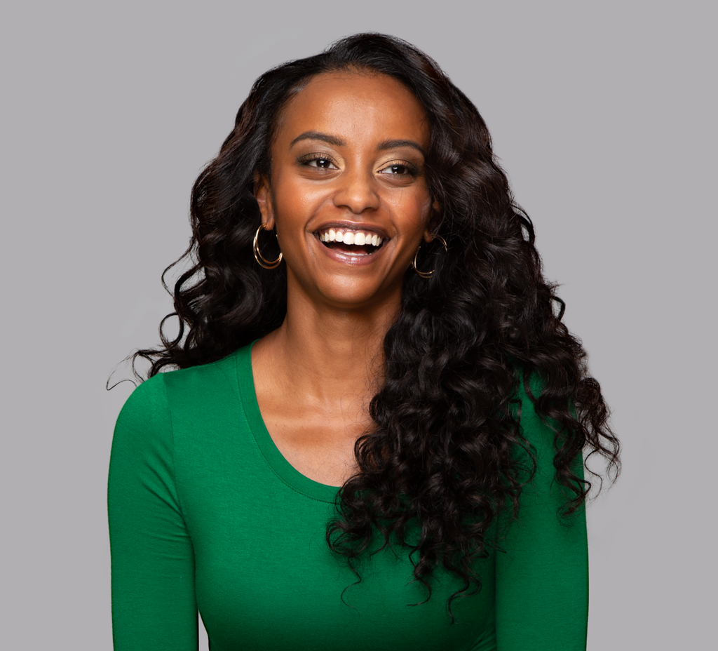 Front view of Natural Black Deep Wave Wig on model wearing green, 16-24", 13x4 Lace, Human Hair, Soft Flowing Waves, Stylish and Wear-and-Go