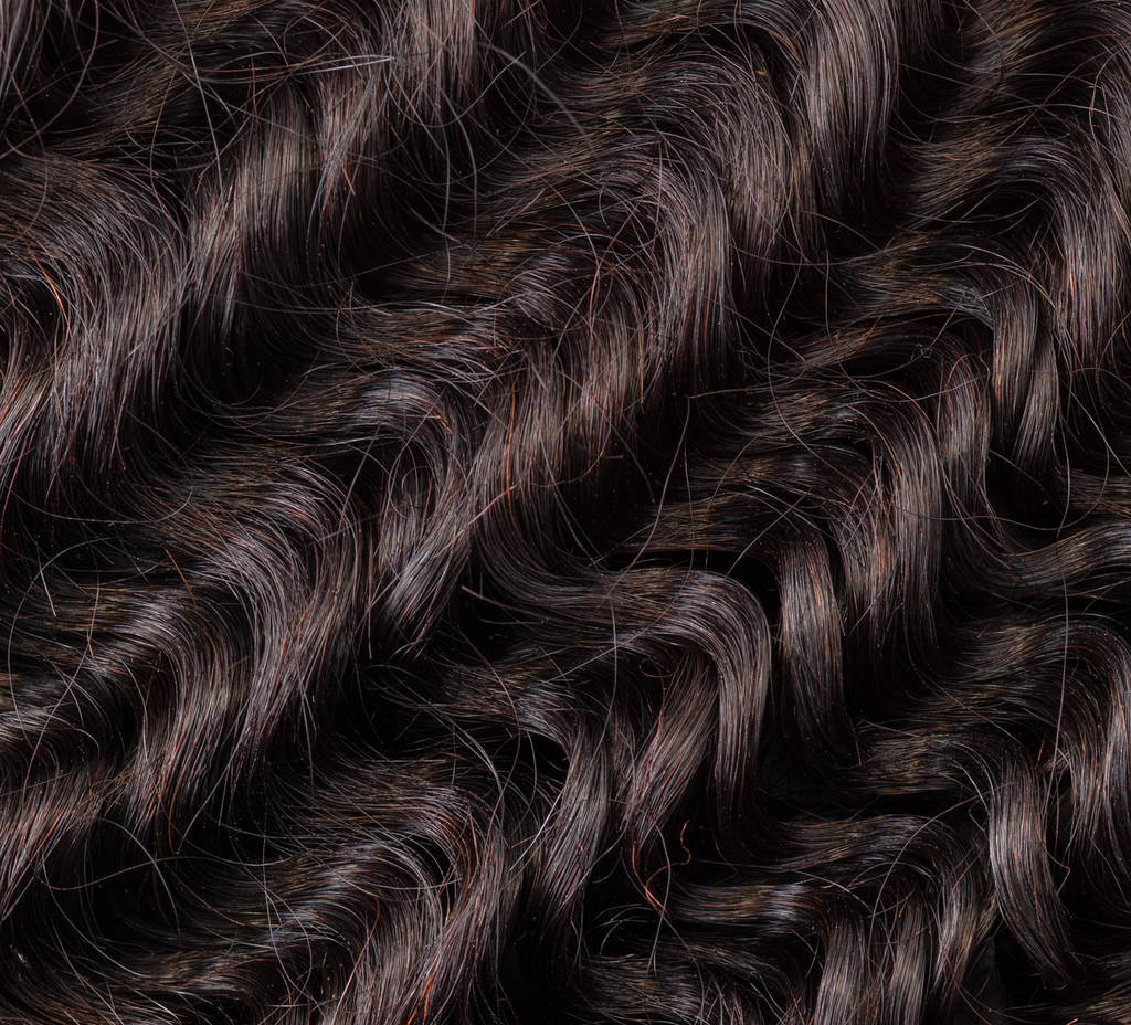 brazilian deep wave hair bundle close-up soft defined curls natural black shiny bouncy texture