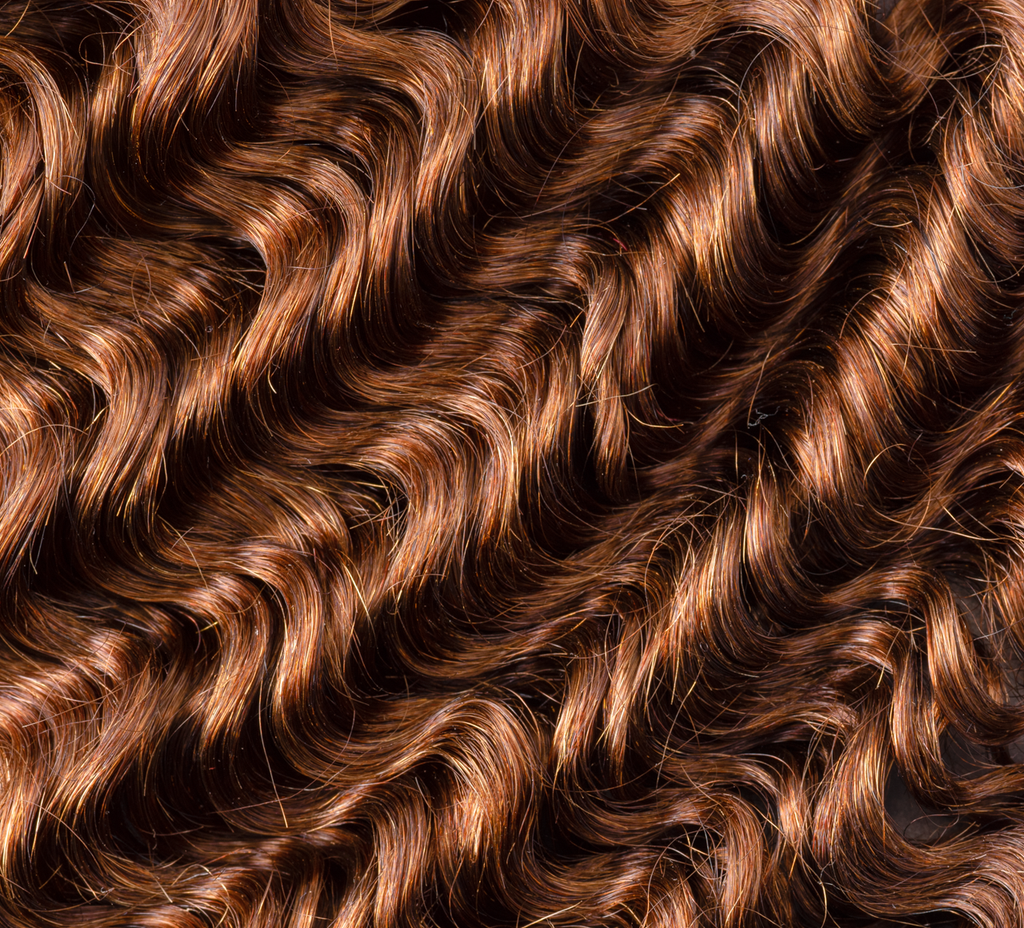 brazilian deep wave hair bundle close-up soft defined curls caramel brown shiny bouncy texture